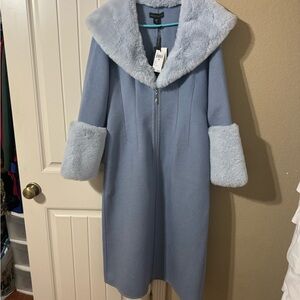 Brand New. Never worn. Beautiful Ice Blue long coat